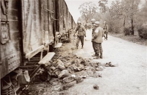 US soldiers view the Death Train